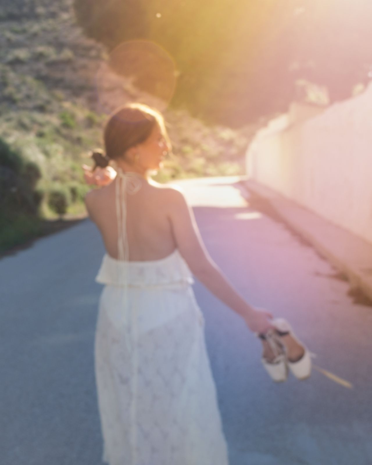A flowy midi skirt, with an attractive A-line cut, made from a gorgeous lightly see-through, fluffy, ruffled fabric in creamy white